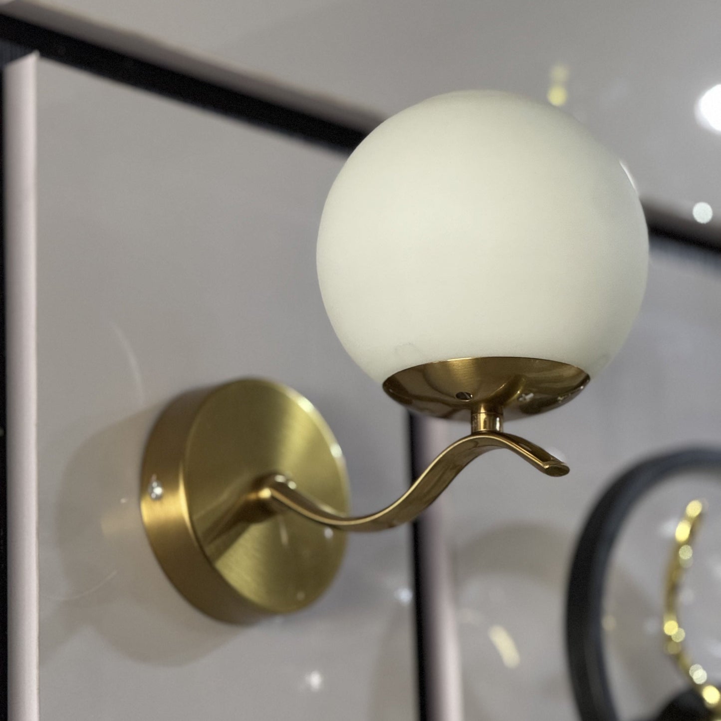 Metal Frame Wall Lamp with White Glass